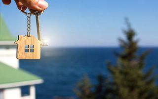 key to a beach home vacation rental property